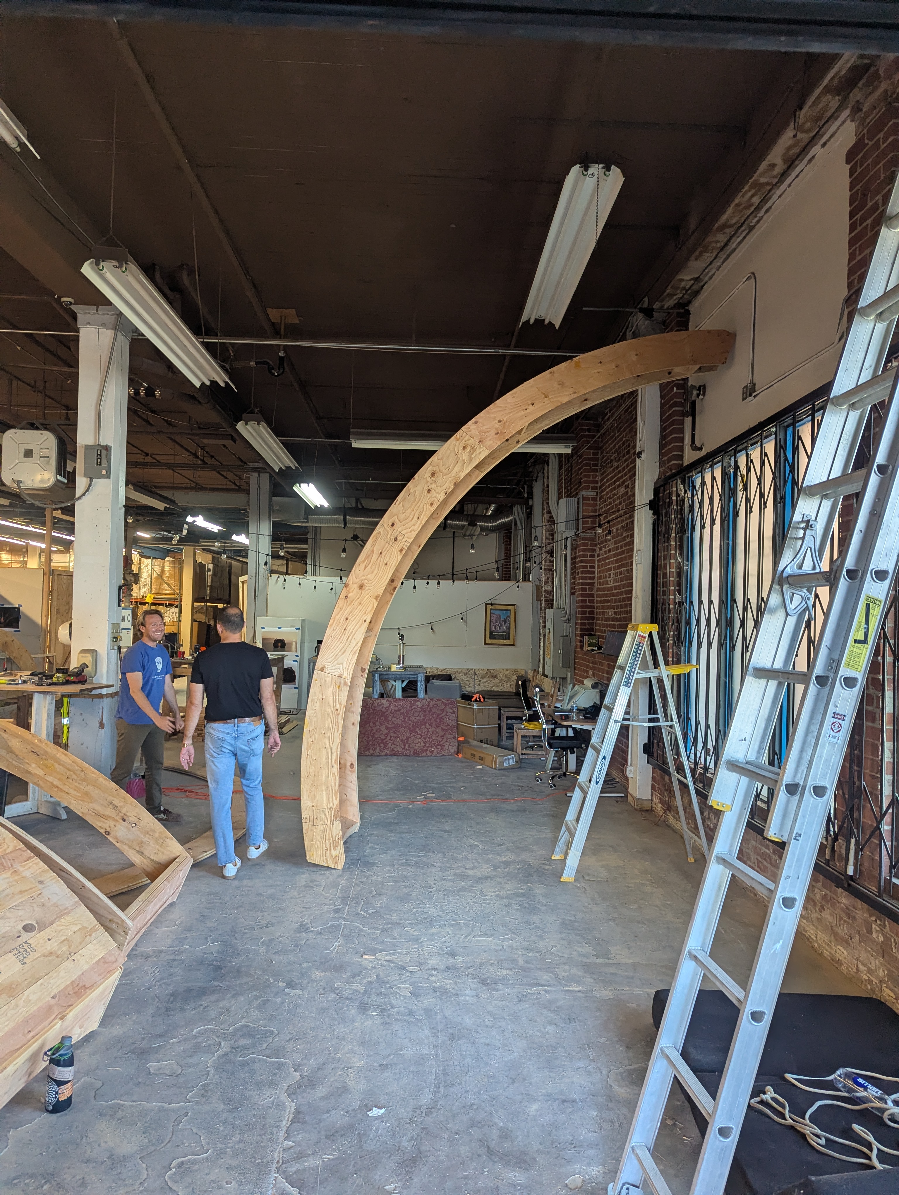 Curved wooden ribs assembled in the workshop